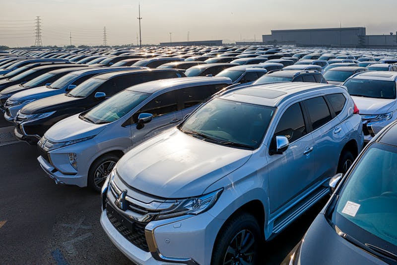 cars parked under the sun